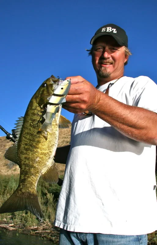 Smallmouth and their tenacious attitude are here too; BBZ's Ron T with a swimbait smallie, nice. Photo by Bill Siemantel 