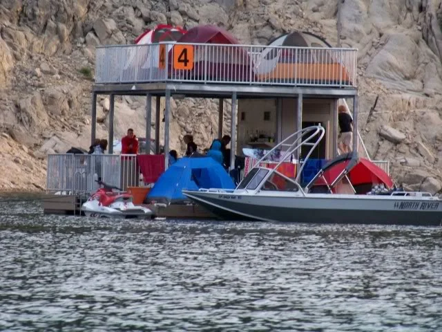 Floating campsites complete with toilets, electricity, sinks, propane bbqs, just bring your own drinking water and food, look closely these folks have a full bar