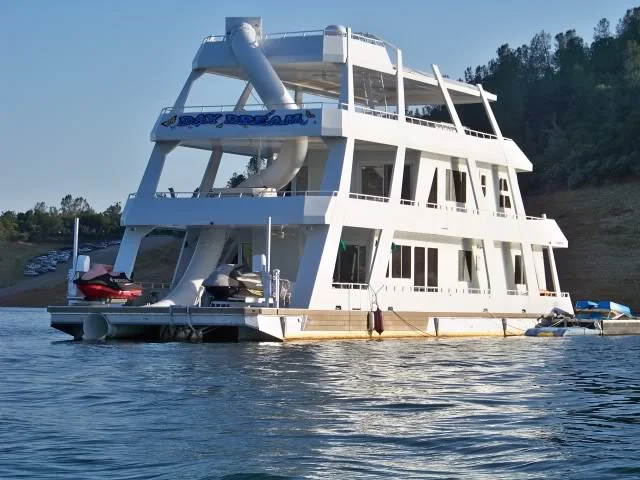 Water slide with a house boat attached