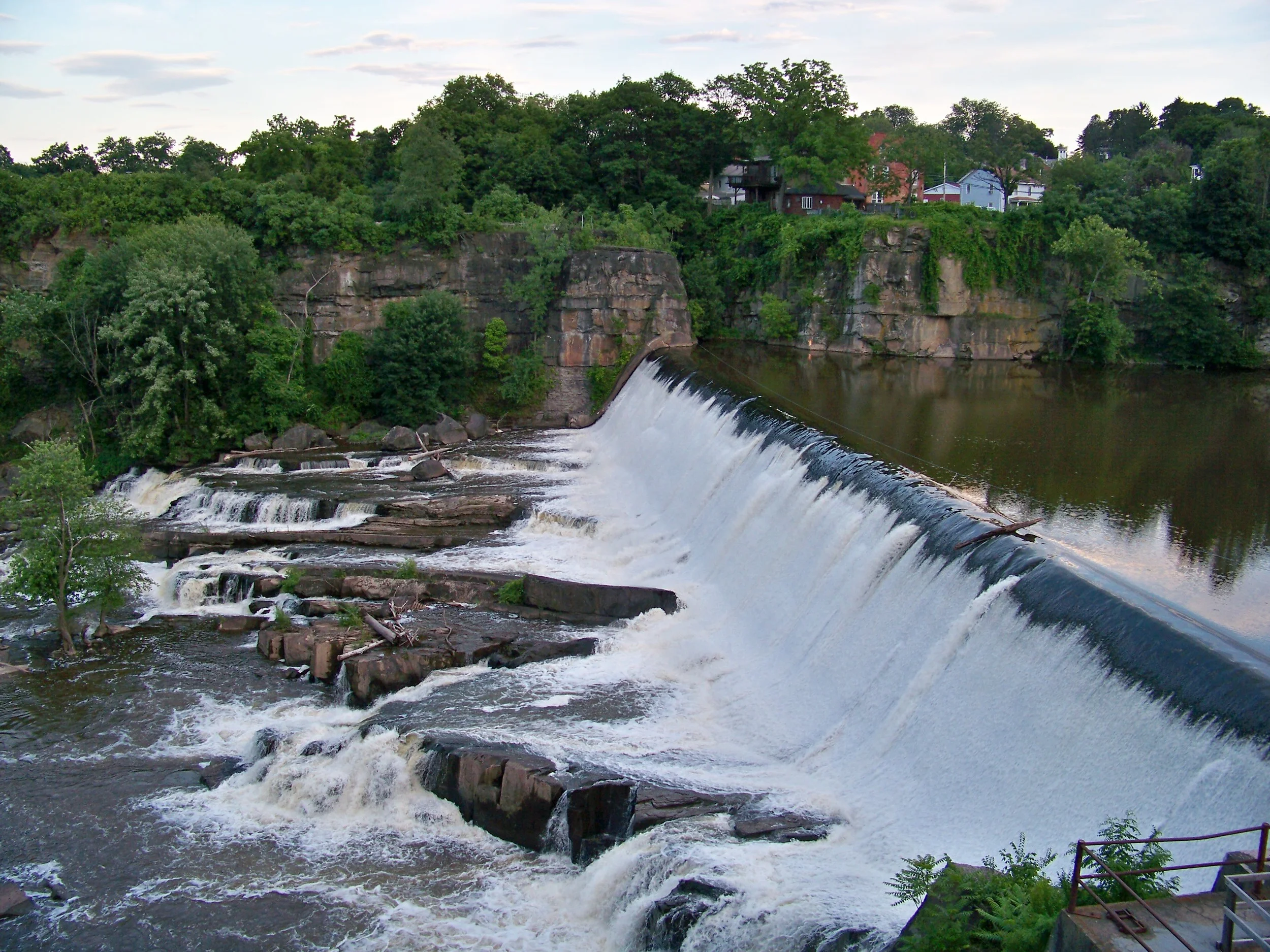 Near Woodstock just before joining the Hudson River in the town of Saugerties is Esopus Creek and its dam waterfall.