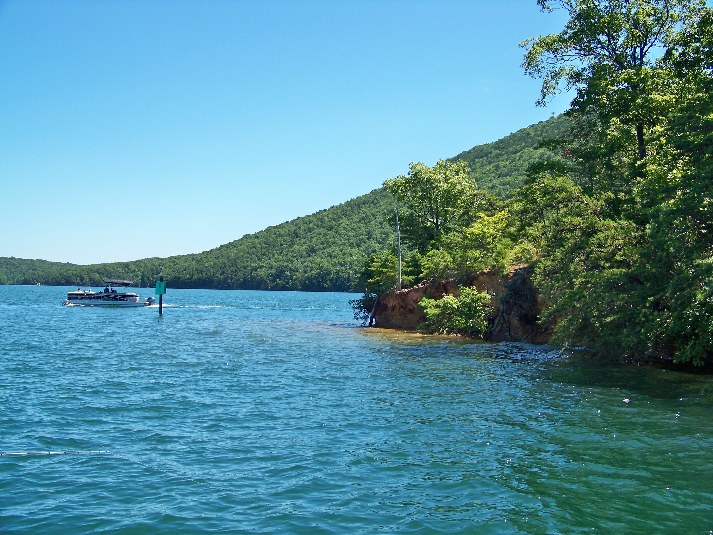 A steep eroding clay point near the dam.
