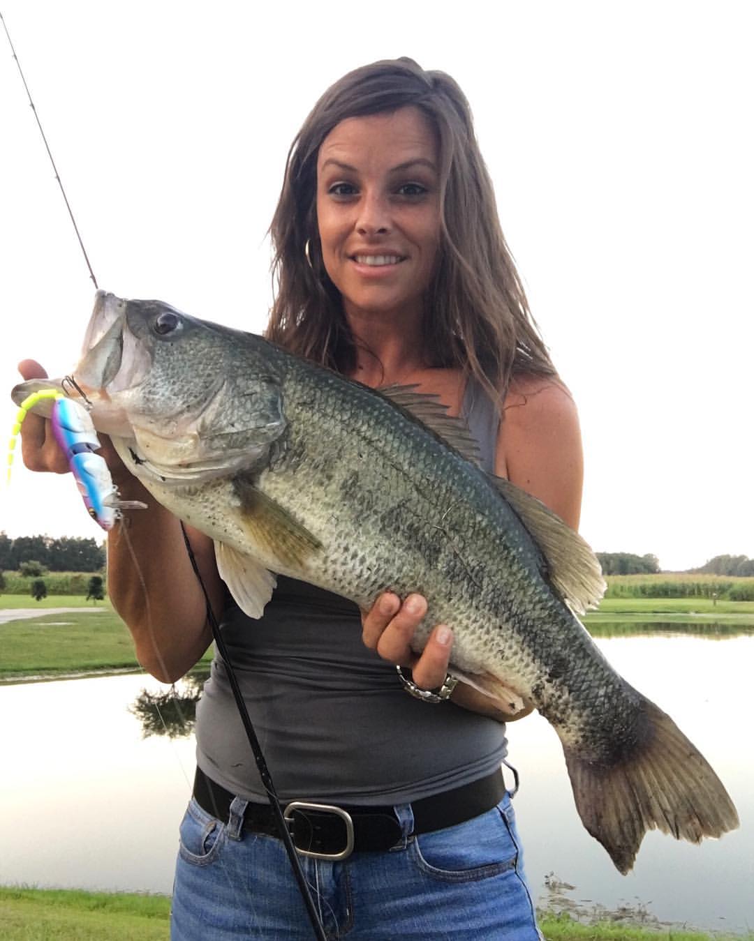 Samantha Gay with her monster bass My #firstcatch of the day, and my first #BBZ1Rat catch, weighing seven pounds, two ounces, and measuring 25 inches long! #AirrusRods #SPRO #BBZ1Rat #2ndBest