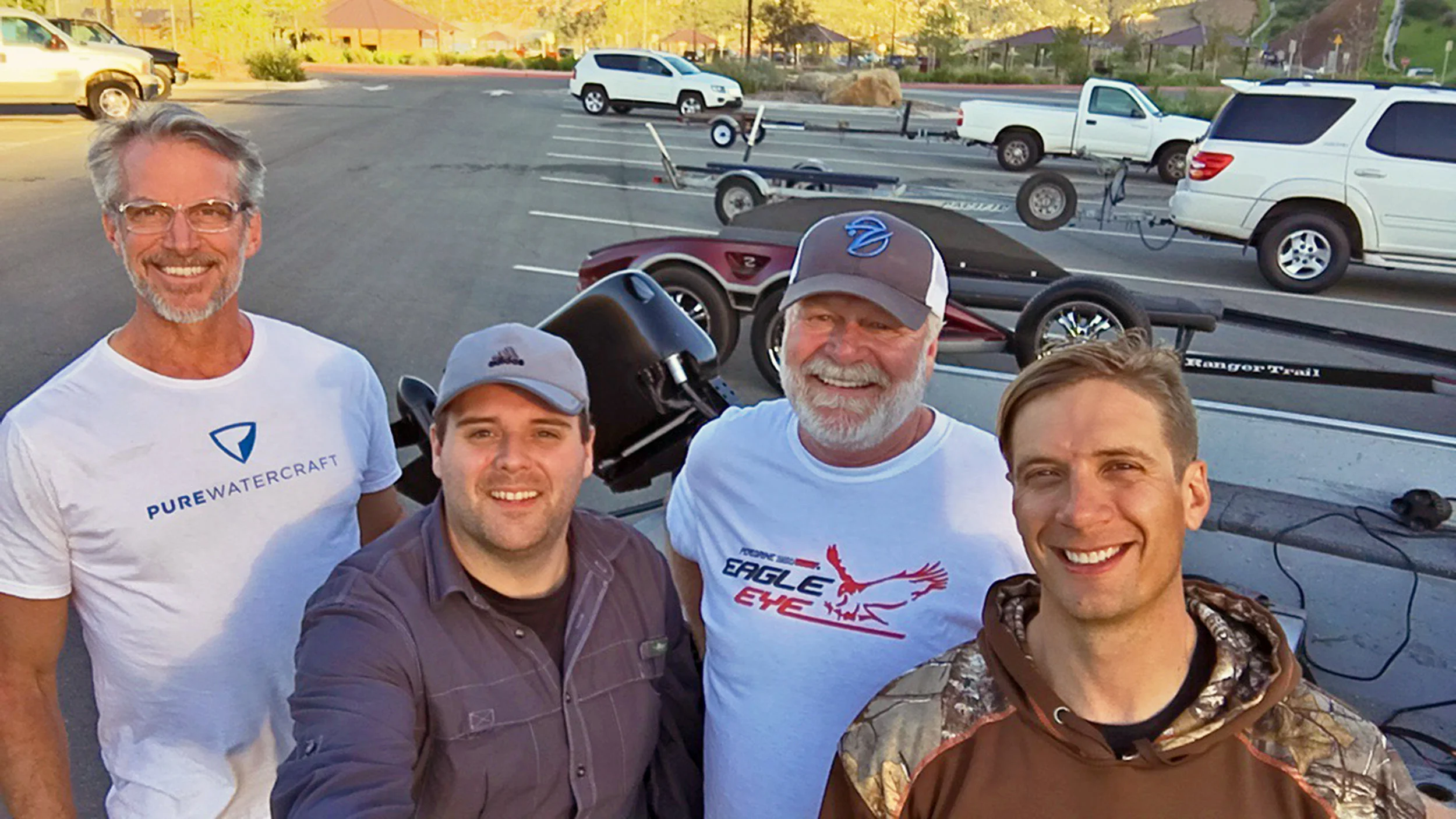 Well earned smiles by Team Pure Watercraft - Left to right; Pure Watercraft Ambassador and former Olympic Rowing Medalist Ed Ives, Pure Watercraft Technical Assistant Chris Clarke, Professional Angler and Outdoor Writer Derrek Stewart, Professional Angler and Television Host Troy Lindner. Ed, Chris, and many others are not only behind the scenes, they make days like today possible. Photo by Chris Clarke
