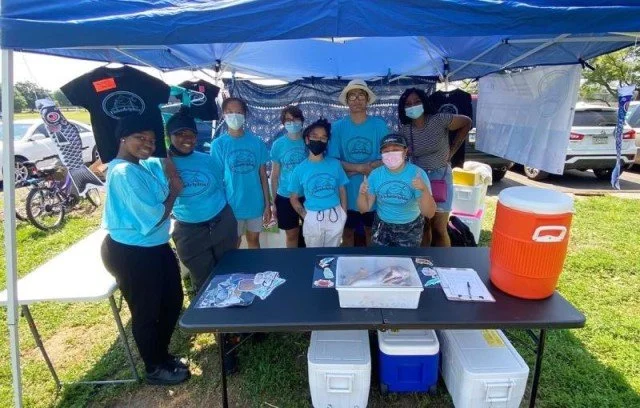 HIGH SCHOOL STUDENTS BRING SEAFOOD TO LOW-INCOME CONSUMERS