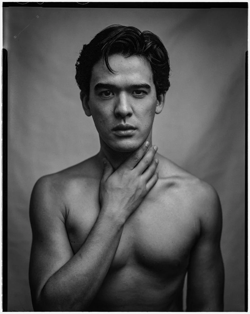 emilio-shirtless-hand-on-neck-black-and-white.jpg