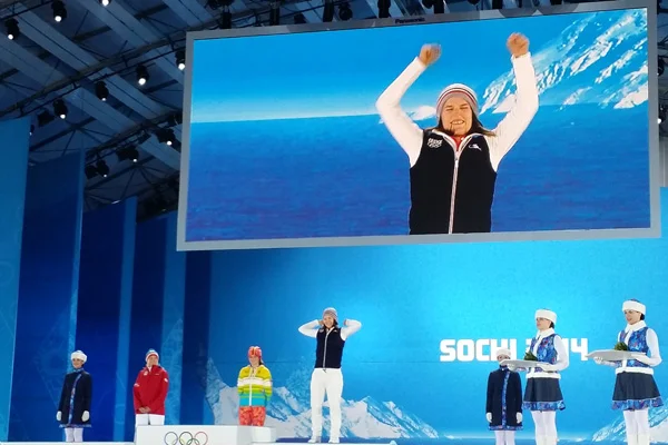 France's Coline Mattel celebrates as she's awarded the bronze during medal ceremonies for the first ever women's ski jumping event in the Olympic Games.