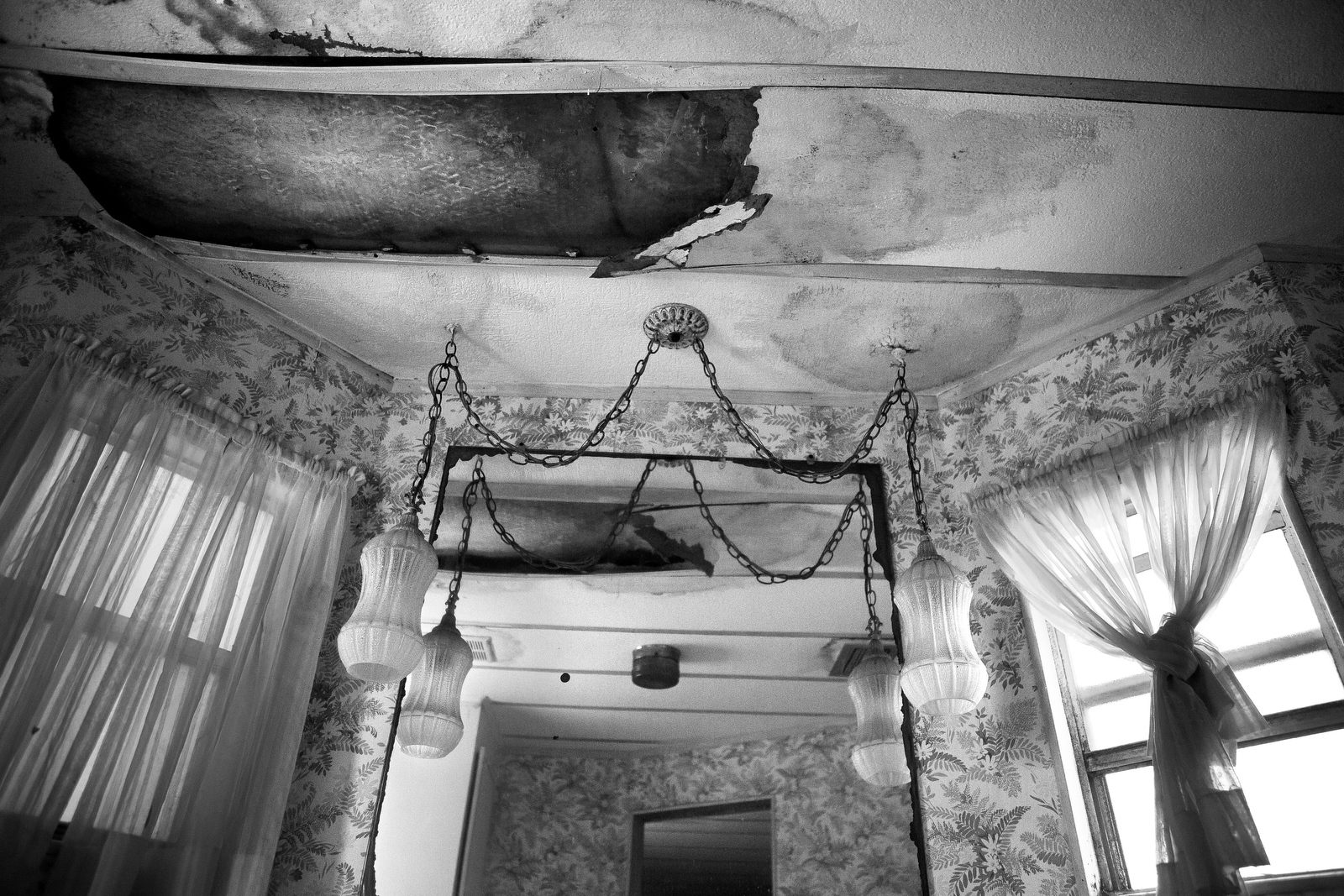  Holes in the ceiling mirror those in the floor of Charles Asaro's home in Hobe Sound. At 98-years-old Charles has been living in the house for nearly 40 years despite it being in desperate need of repairs. 