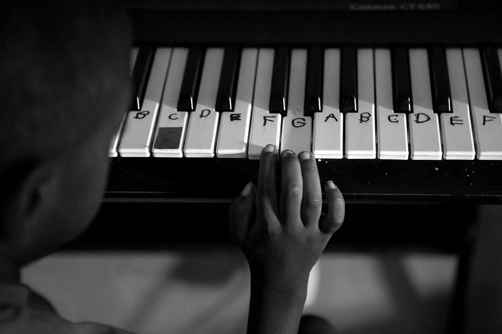  Six-year-old Odarius plays the keyboard and although he does not communicate very much verbally, he can play music and type complicated words and sentences on the computer. 
