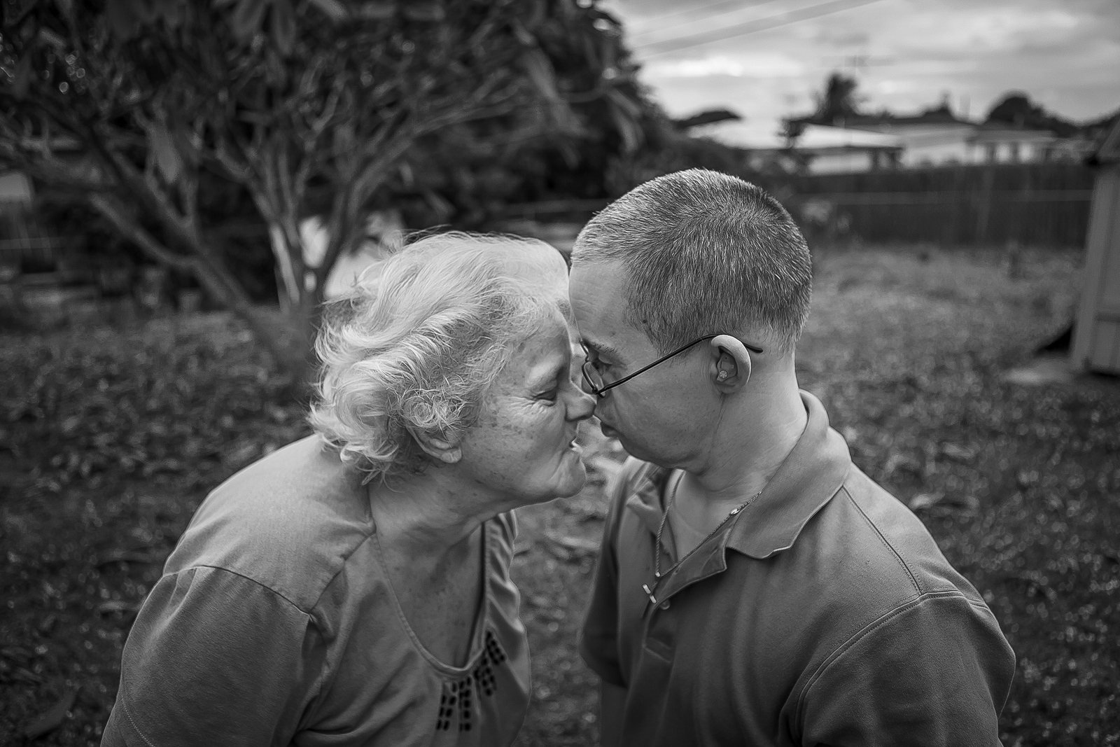  Wanna Tebby, 81,&nbsp;jokes around with her nephew Raymond Hommel, 49,&nbsp;in the backyard of their house. Wanna has taken complete care of Raymond, who has Down syndrome, since he was 14 years old. Wanna worries about both of them needing addition