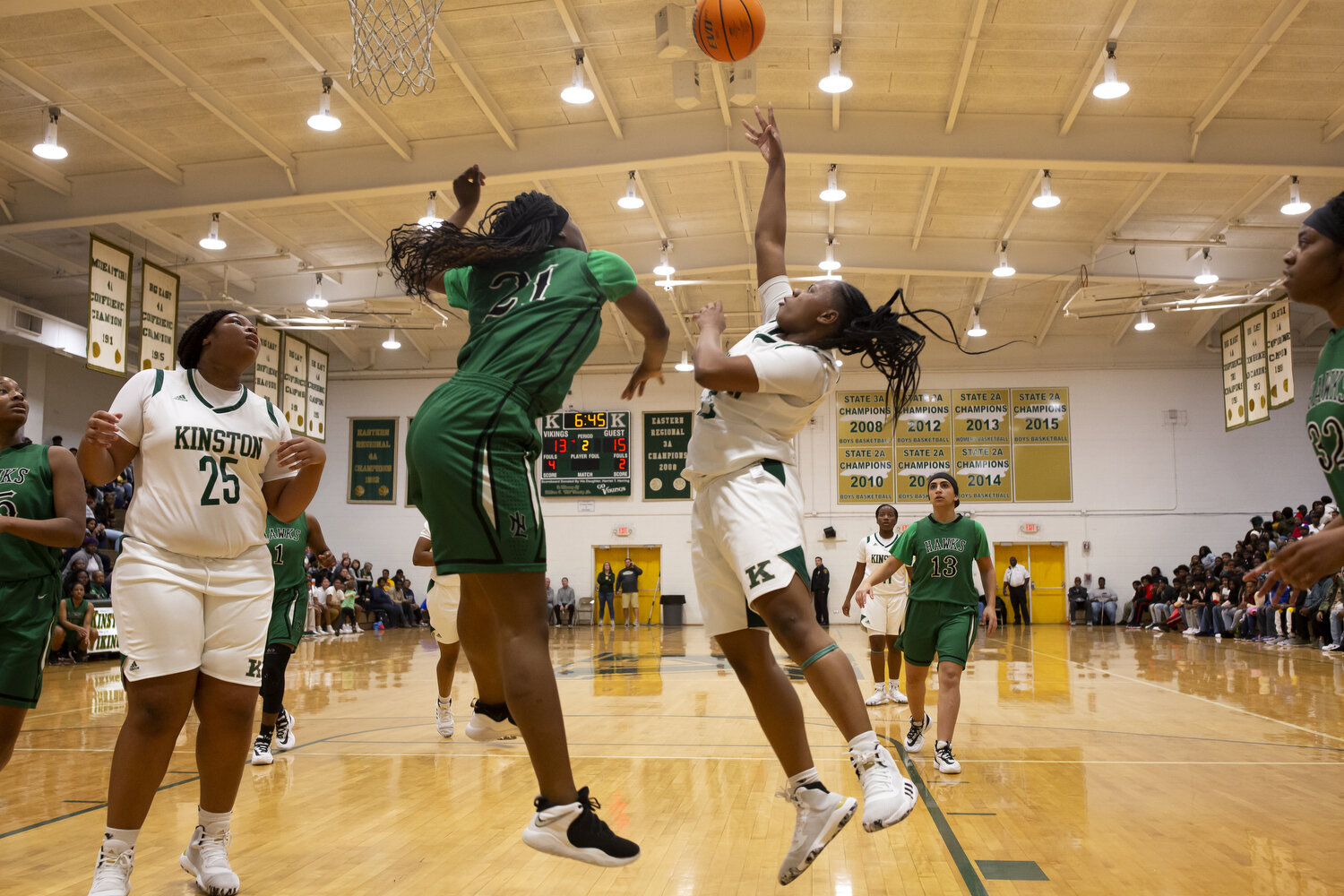  In Kinston, North Carolina, basketball is king — or queen, as the case may be.  See the full story with text on NPR here:  Girls’ Basketball Team Is ‘Another Definition for Family’  