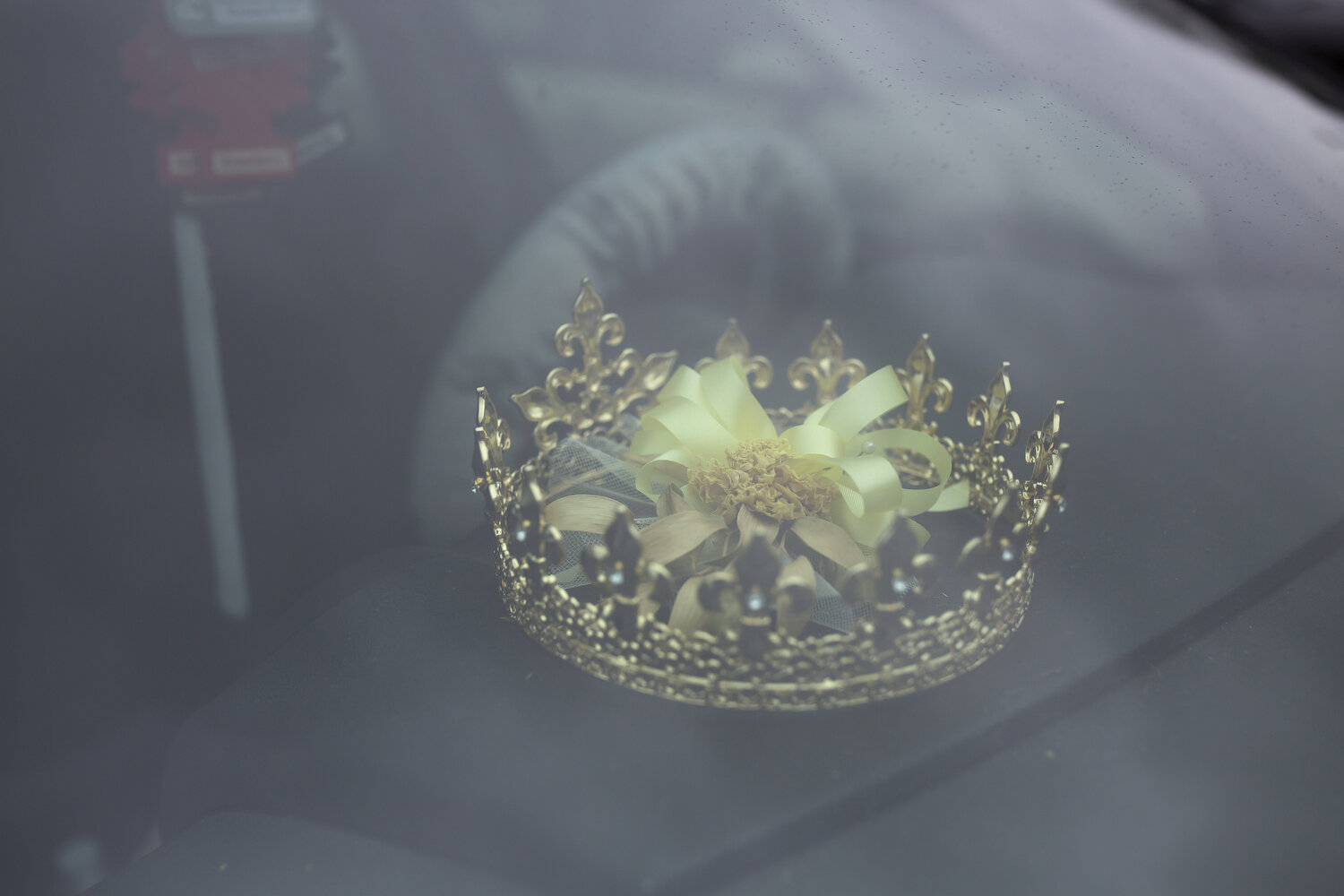  Quiaira Powell's homecoming queen crown sits on the dashboard of her car. 