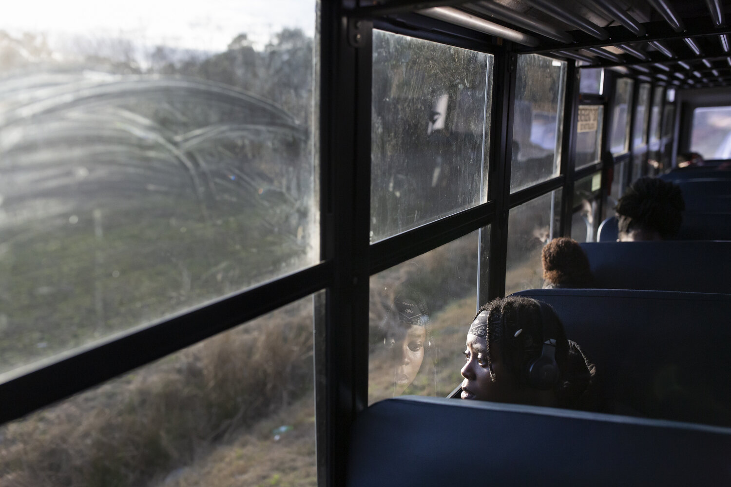  Junior Kenya Forbes looks out of the bus window on the way to a game. With eight seniors leaving the team, Forbes will be one of only a few players with varsity experience for the upcoming season. Despite the challenges of rebuilding the team and th