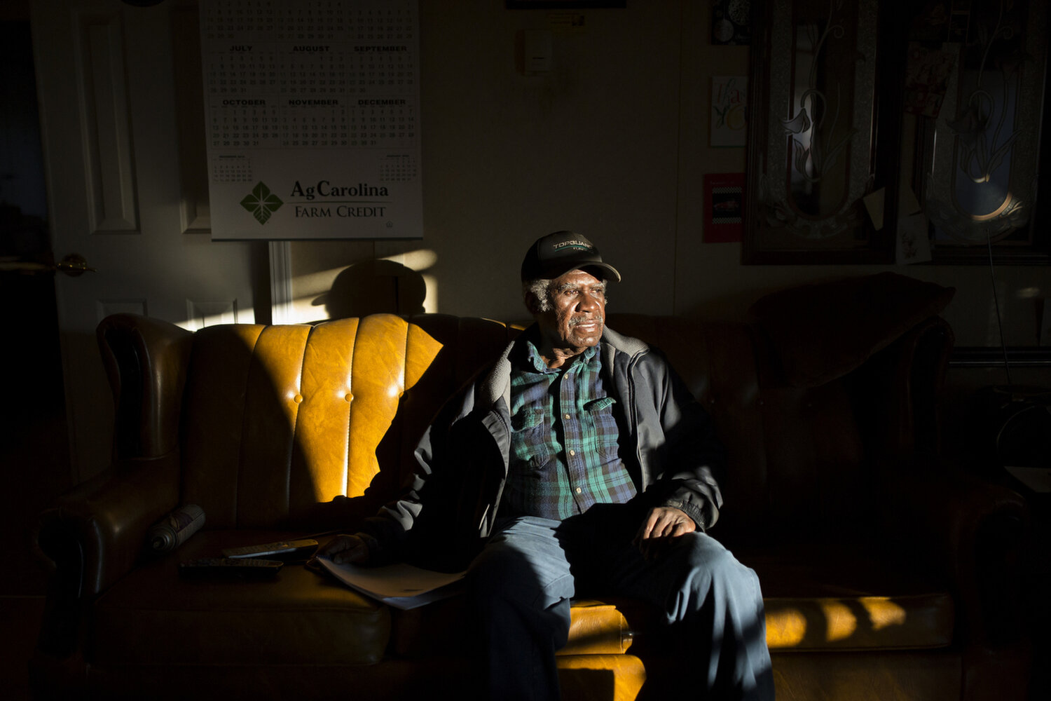  Former extension agent Haywood Harrell sits in the office on his farm in Tillery. Few Black farmers still exist in Halifax County and many Black landowners now rent their land to white farmers. Harrell, however, continues to grow cotton, corn, soybe