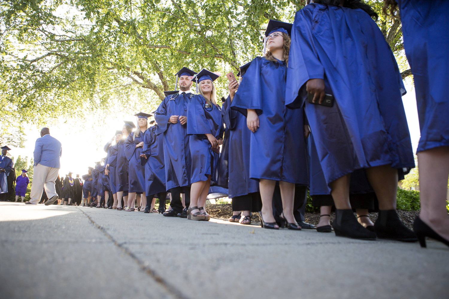  Students line up before graduation at Lenoir Community College on Thursday evening, May 9, 2019. [Madeline Gray / Free Press] 
