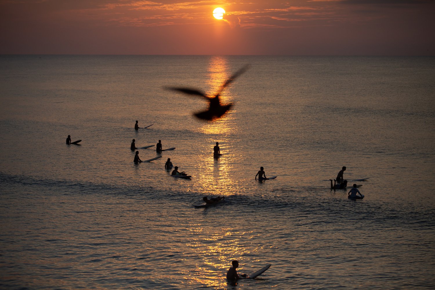  People surf as the sun comes up at Wrightsville Beach, North Carolina.  For The Washington Post 