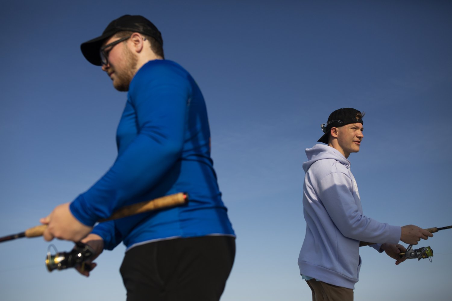  Josh and Danny Jones fish off of Cane Faircloth’s charter boat near Holden Beach, North Carolina.  For The Wall Street Journal 