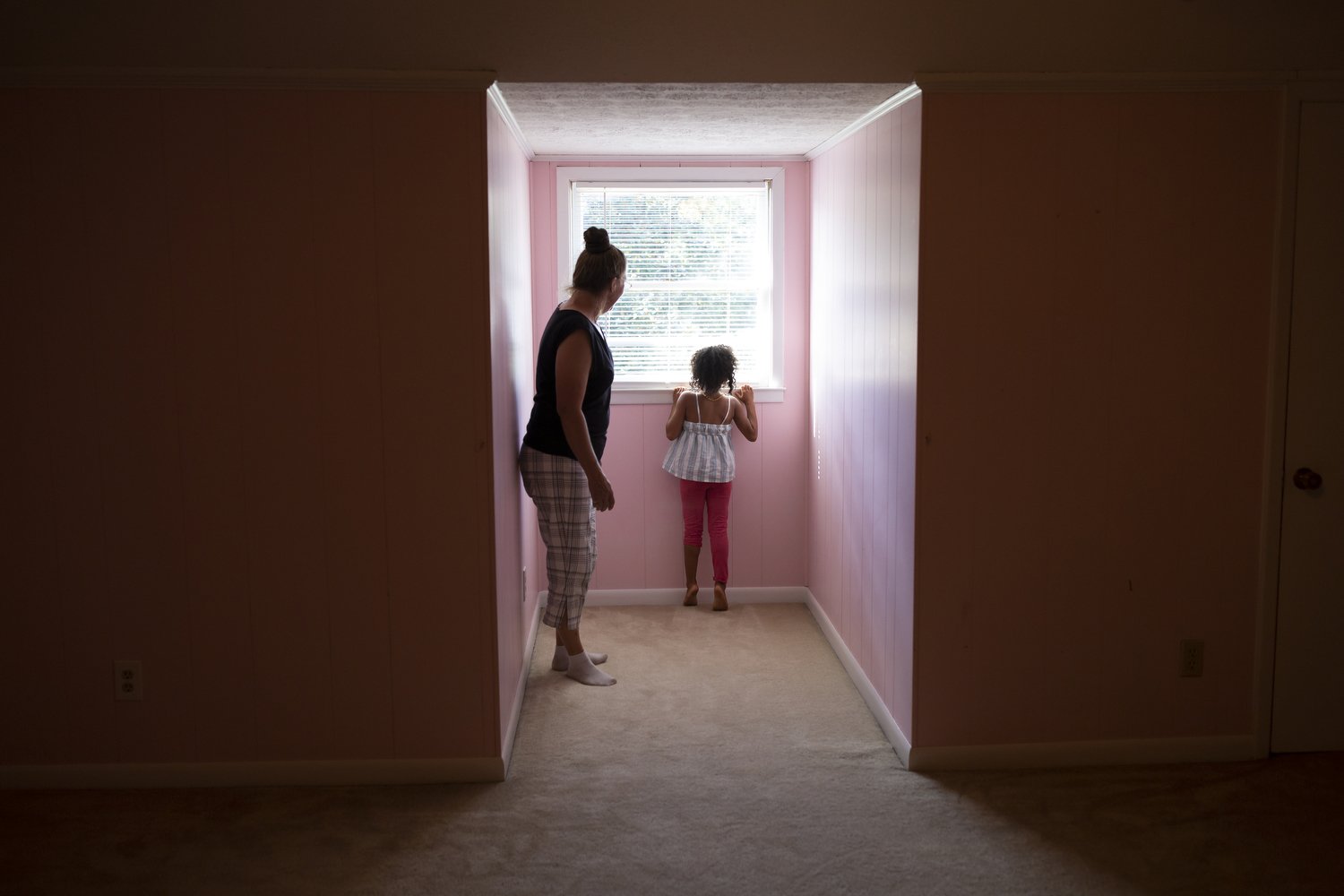  Terri Straka, left, explores her new home with her granddaughter Sophia Raymund, 5, right, in Myrtle Beach, South Carolina. Straka is part of a buyout program to relocate Horry County residents away from flood prone areas and into safer homes.  For 