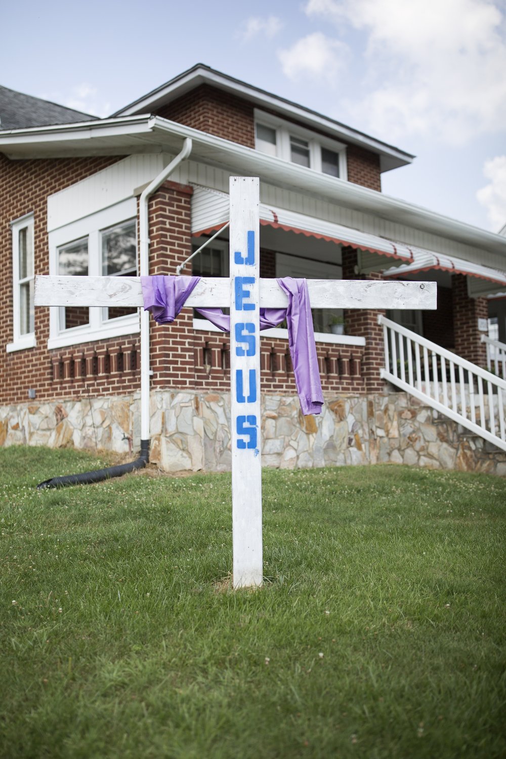  A cross stands outside a home in Galax, Virginia. With a population of just around 7,000, the town of Galax in rural southwest Virginia has one of the fastest-growing Hispanic populations in the state. Residents in town have a wide range of views ab