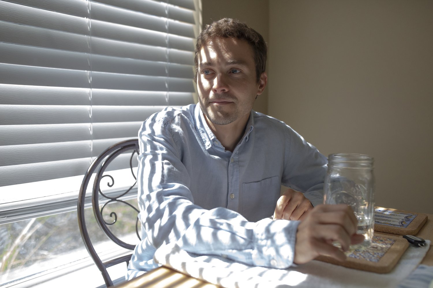  Ben Williamson sits in the dining room of his home on Starcreek Circle in Myrtle Beach, South Carolina. He and his wife moved from New Jersey without seeing the house in person and without receiving information about the past flooding that has happe