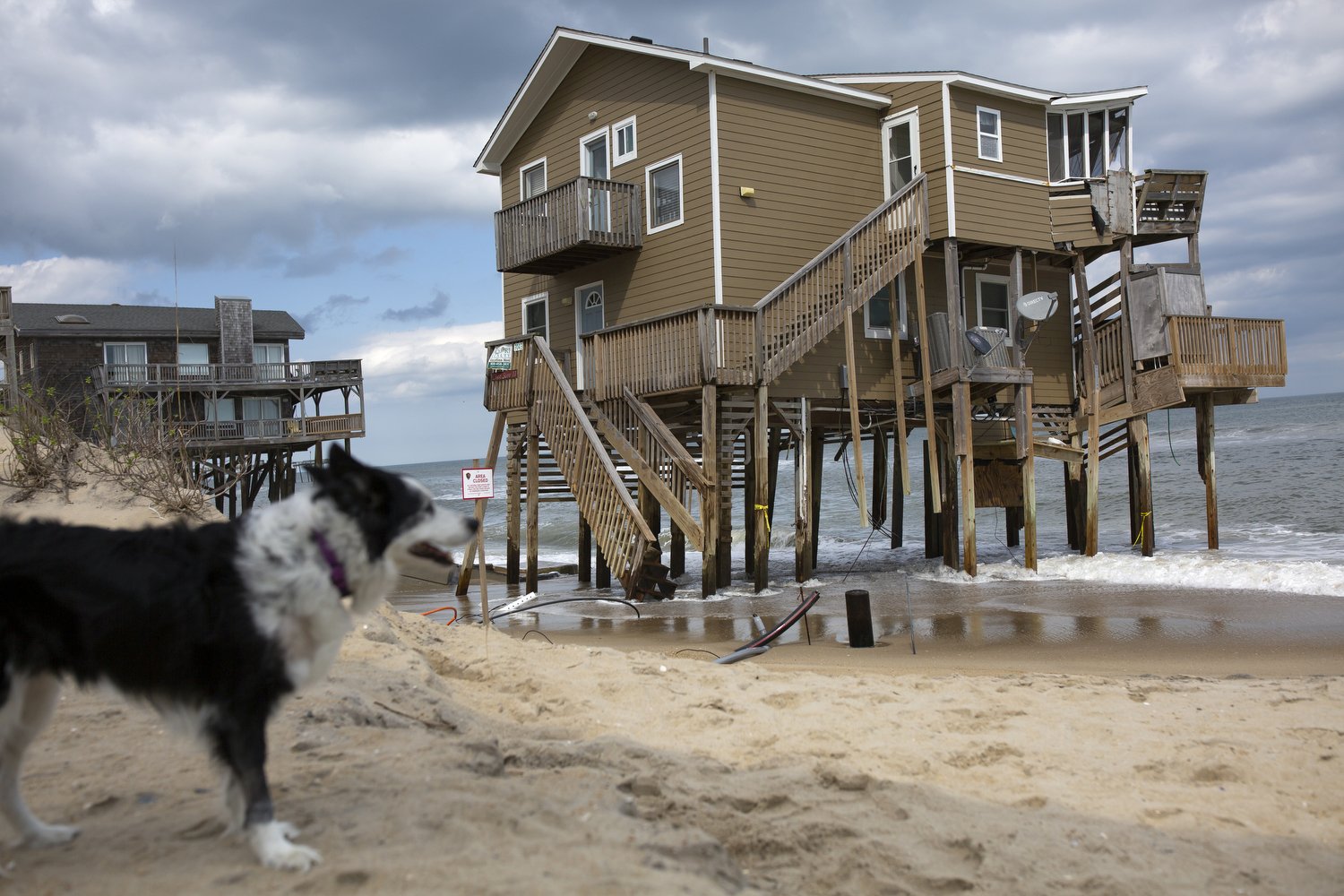  A house along the beach on Ocean Drive in Rodanthe, North Carolina is in imminent danger of falling into the sea. Residents are trying to find ways to mitigate future damage but one of the countyÕs main goals during beach nourishment projects is to 