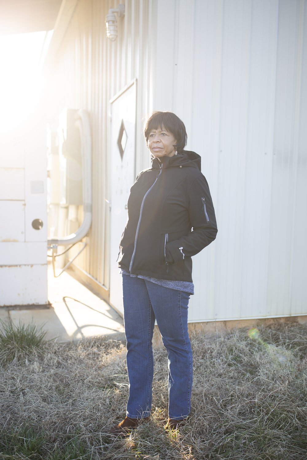  Renee Stewart stands outside the building that used to house Taylor Fish Farm on her family’s land in Cedar Grove, North Carolina. The fish farm was hailed as an innovative success story just a few years ago until Stewart and her brother Valee Taylo