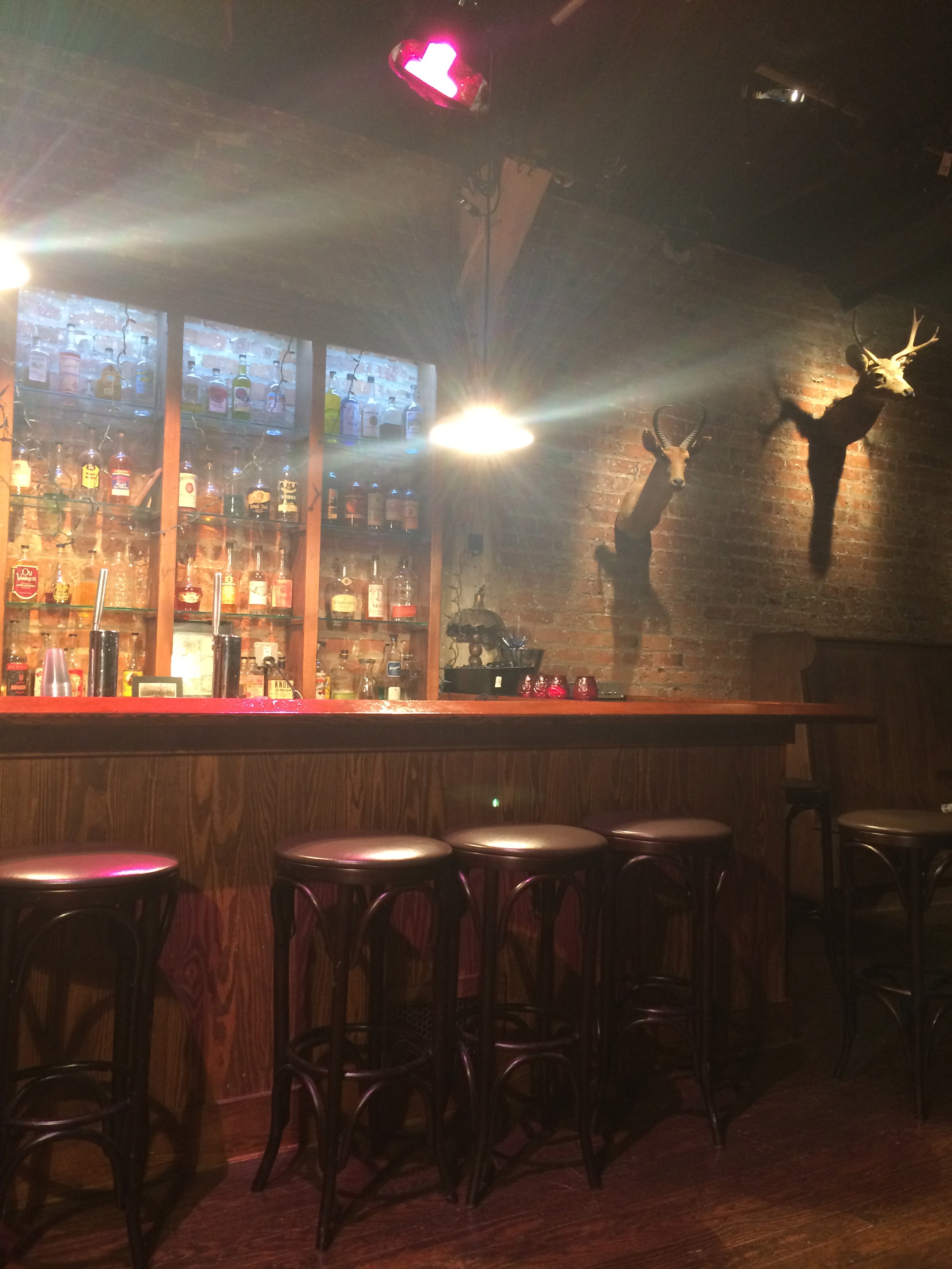 The "Speakeasy" set, where bottles are filled with colored water due to regulations around serving alcohol in conjunction with nudity. However, according to our guide, the actors have monthly "employee appreciation parties" where they bring in real booze.