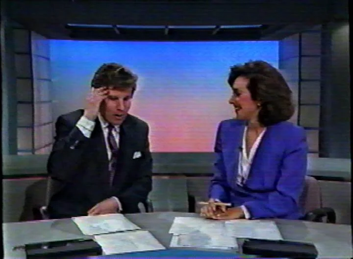 Steve Dunlop (left) and co-anchor Rosanna Scotto interviewing "Charlie Taylor" via phone, perhaps not quite making sense of her claim. Image from WNYW/New York. 