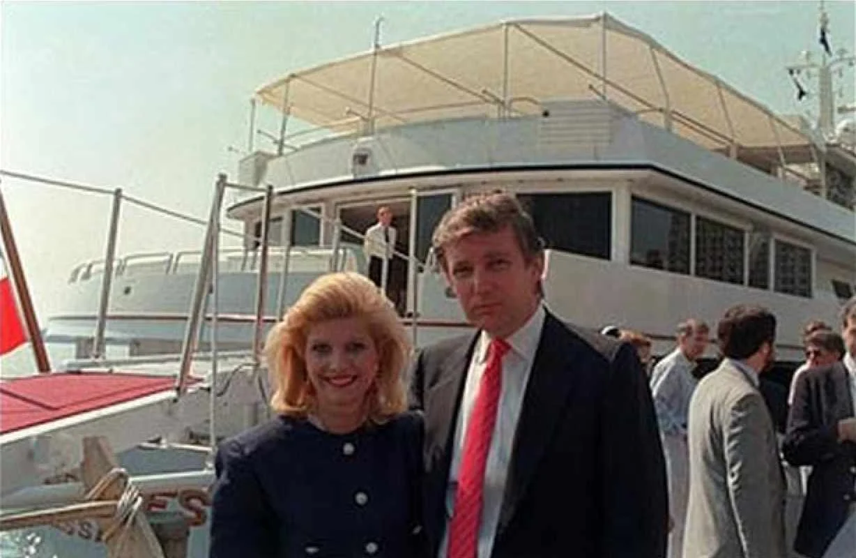 Donald Trump and his then-wife, Ivana, aboard their new yacht, 1988. Courtesy AP via CBS News . 