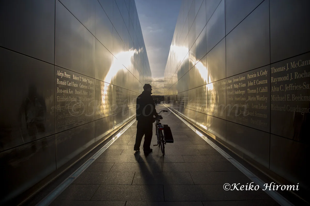 October14 , 2013, Liberty State Park, Jersey City, NJ USA: A man reads names of September 11 victims at "Empty Sky" New Jersey September 11 memorial at Liberty State Park, in Jersey City, NJ. Empty Sky is the official New Jersey September 11 memorial to the state's victims of the September 11 attacks on the United States. 
