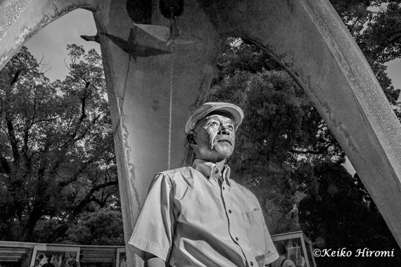 Kunihiko at Hiroshima at the statue of Children's Peace Monument inside Hiroshima Peace Park, where neighborhoods were wiped out by the A-bomb on August 6, 1945.