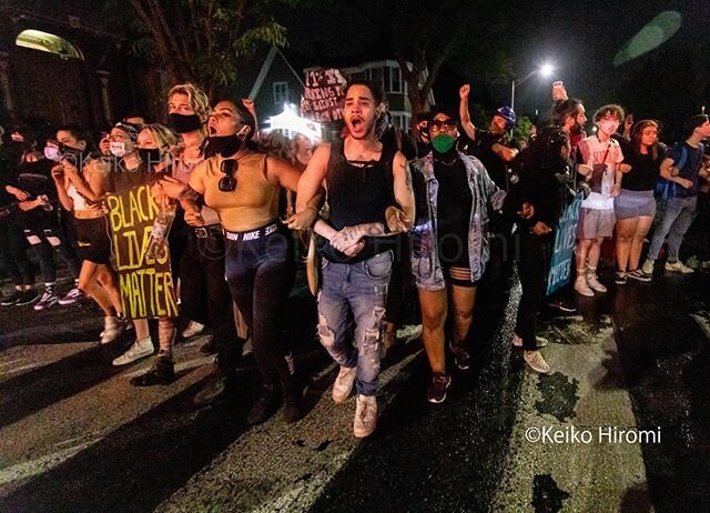 June, 5 2020, Providence, Rhode Island, USA: Protesters march linking their arms together during a rally in response to deaths of George Floyd and Breonna Taylor and against police brutality and racism on Taylor's birthday June 5 in Providence.  Tayl