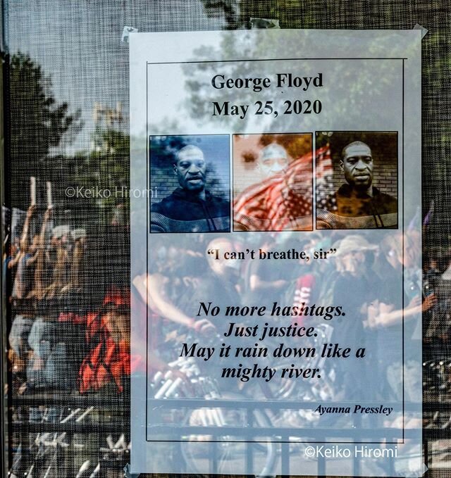 Window reflection of F.T.P. a march to defund police and fund our communities, at Mandela Homes on Washinton Street in Boston on June 10, 2020. 
Hundreds of protesters marched through Washington Street to reach Boston City Hall. It was organized by a