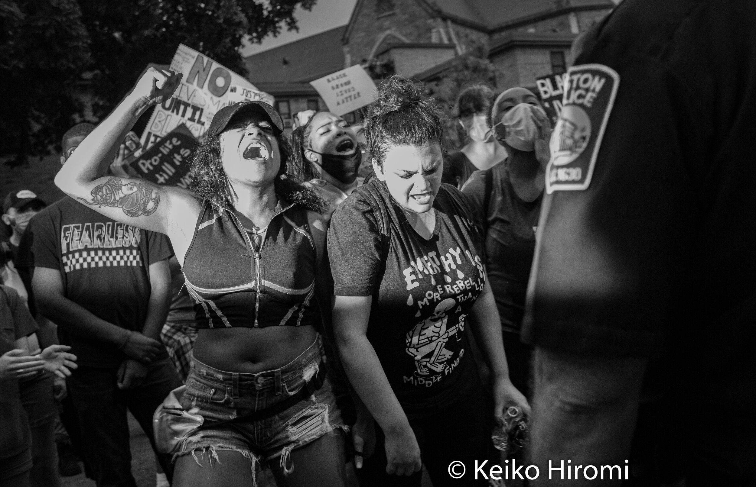  May 29, 2020, Boston, Massachusetts, USA: Demonstrators protest police and racism in front of Boston Police D-4 staion during a rally in response to deaths of George Floyd and against police brutality and racism at Peter's park in Boston, Massachuse