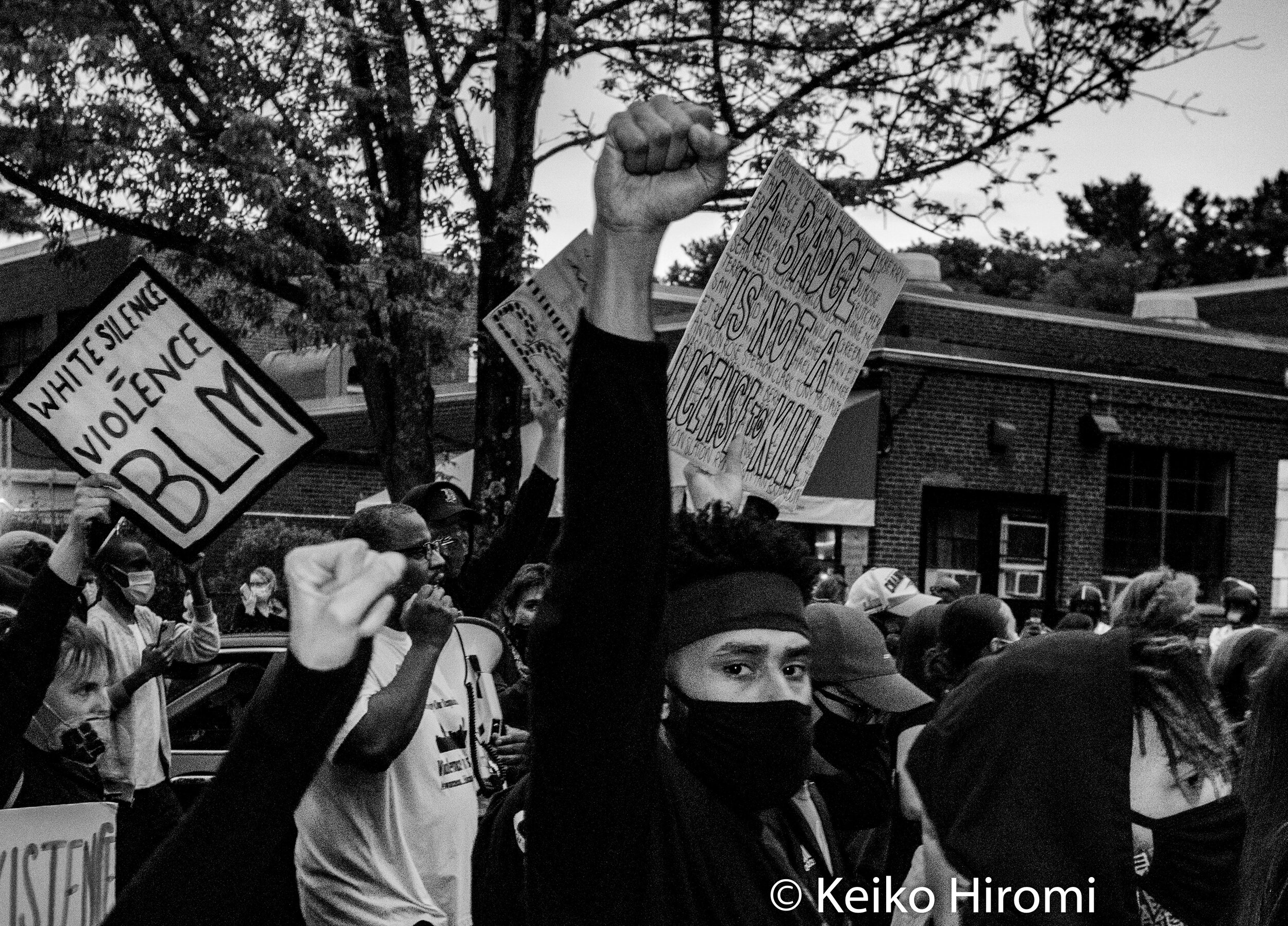  June 2, 2020, Boston, Massachusetts, USA: A protester raises his fist and marches during a rally in response to deaths of George Floyd and against police brutality and racism at Franklin Park in Boston. 