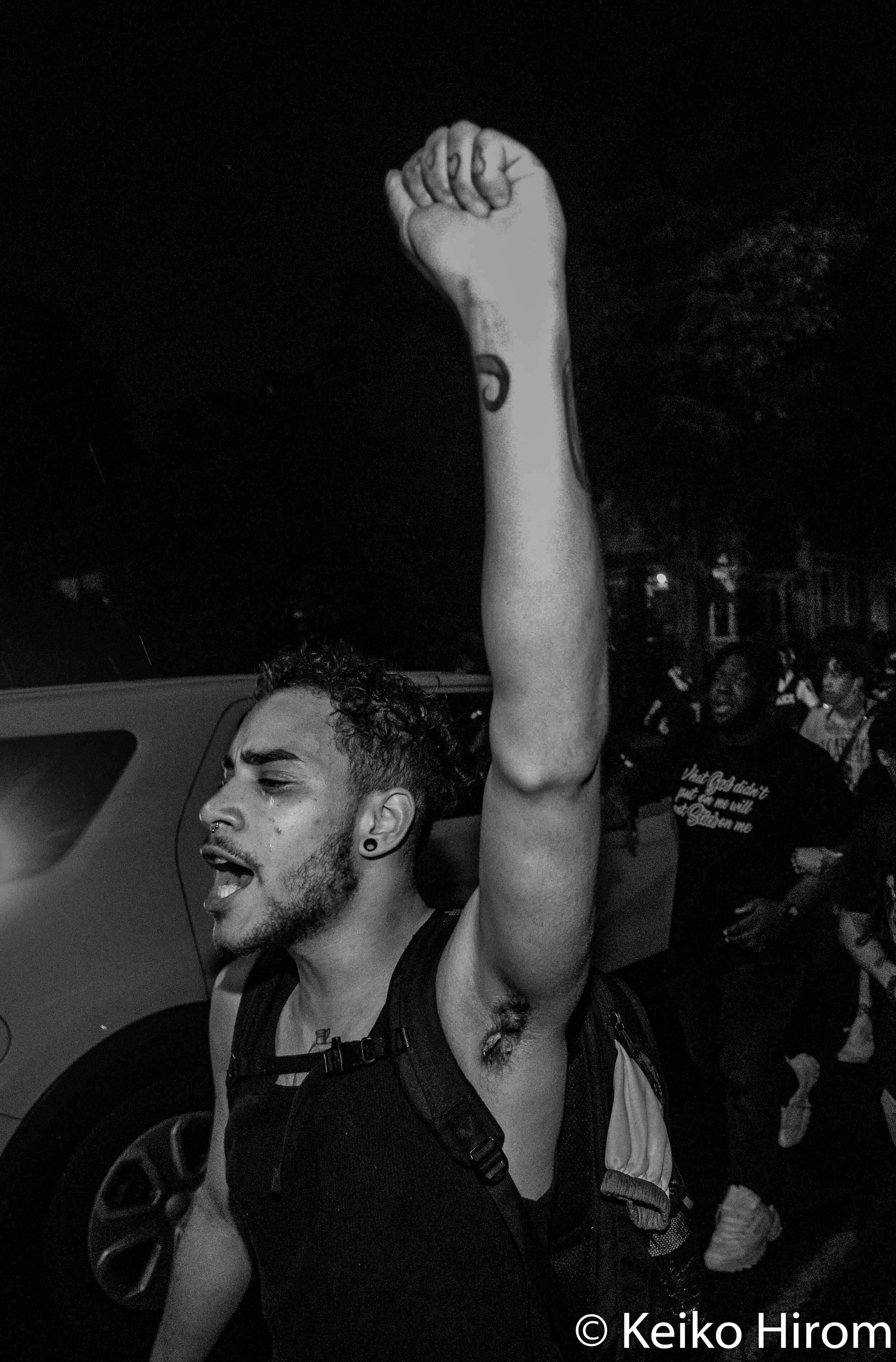  June 5, 2020, Providence, Rhode Island, USA: A protester marching during a rally in response to deaths of George Floyd and against police brutality and racism  in Providence. 