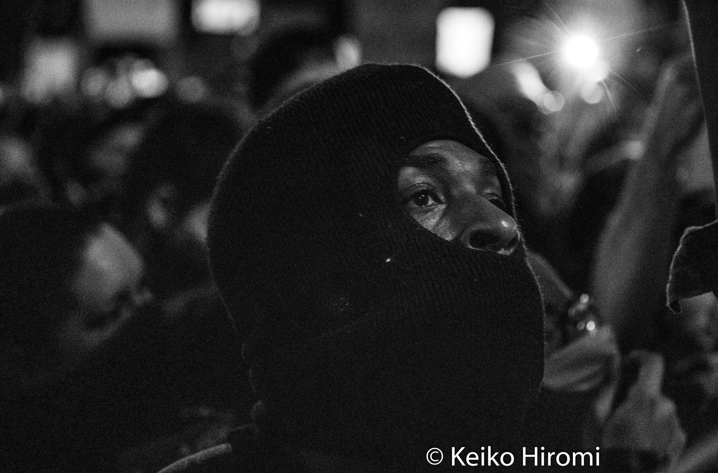  May 31, 2020, Boston, Massachusetts, USA: A protester listening to activists during a rally in response to deaths of George Floyd and against police brutality and racism in Boston. 