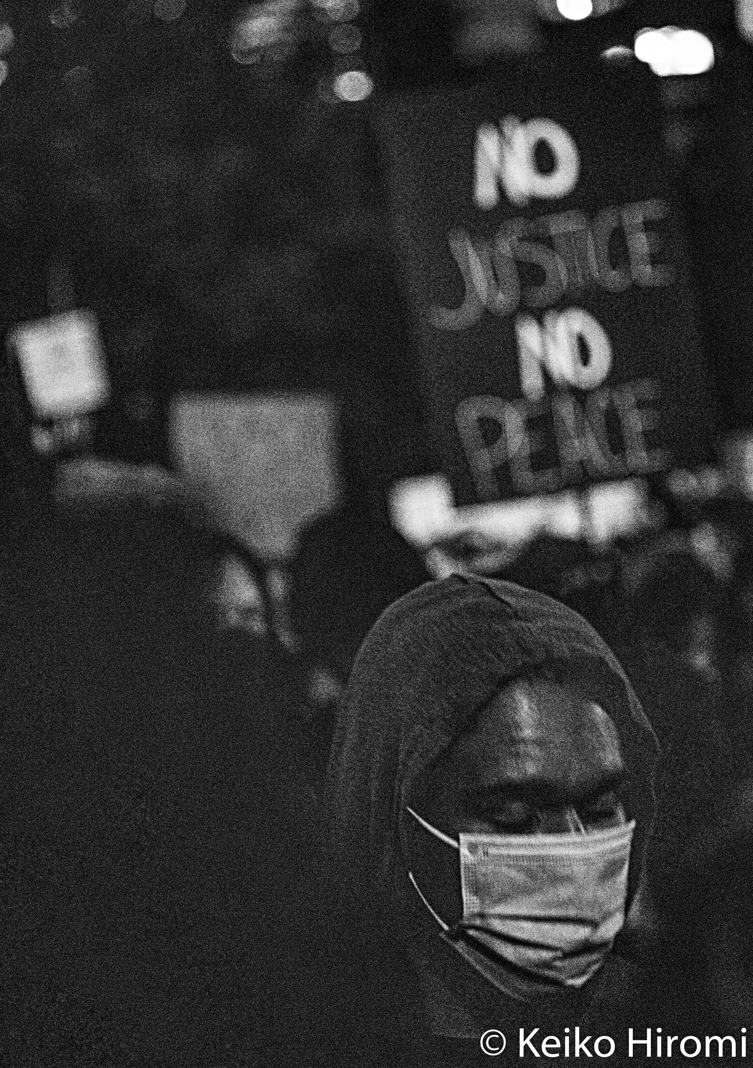  May 31, 2020, Boston, Massachusetts, USA: A protester takes a moment of silence during a rally in response to deaths of George Floyd and against police brutality and racism in Boston. 