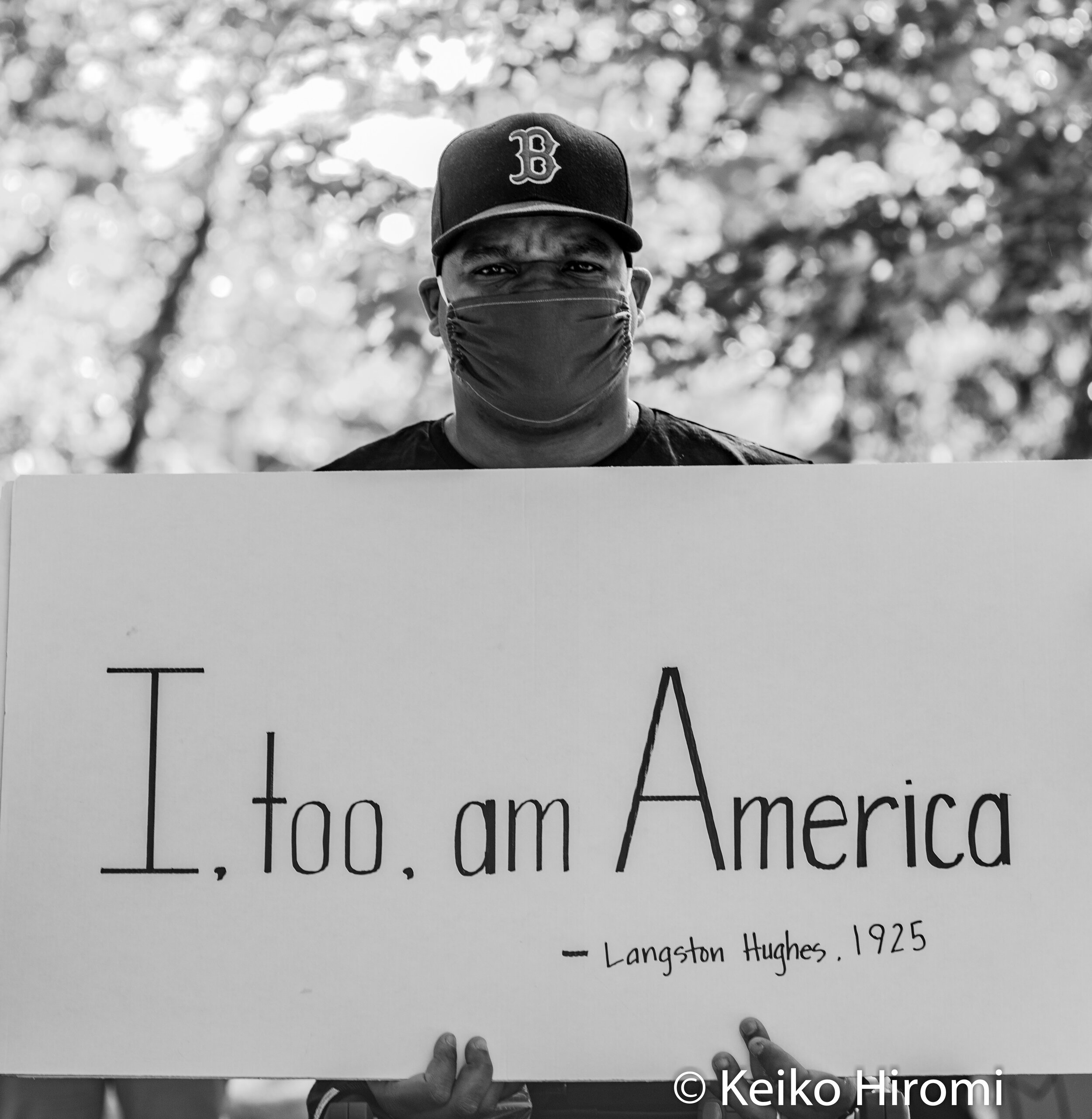  June 8, 2020, Lynnfield, Massachusetts, USA: A protester holds a sign "I, too am America" during a rally in response to deaths of George Floyd and against police brutality and racism in Lynnfield. 