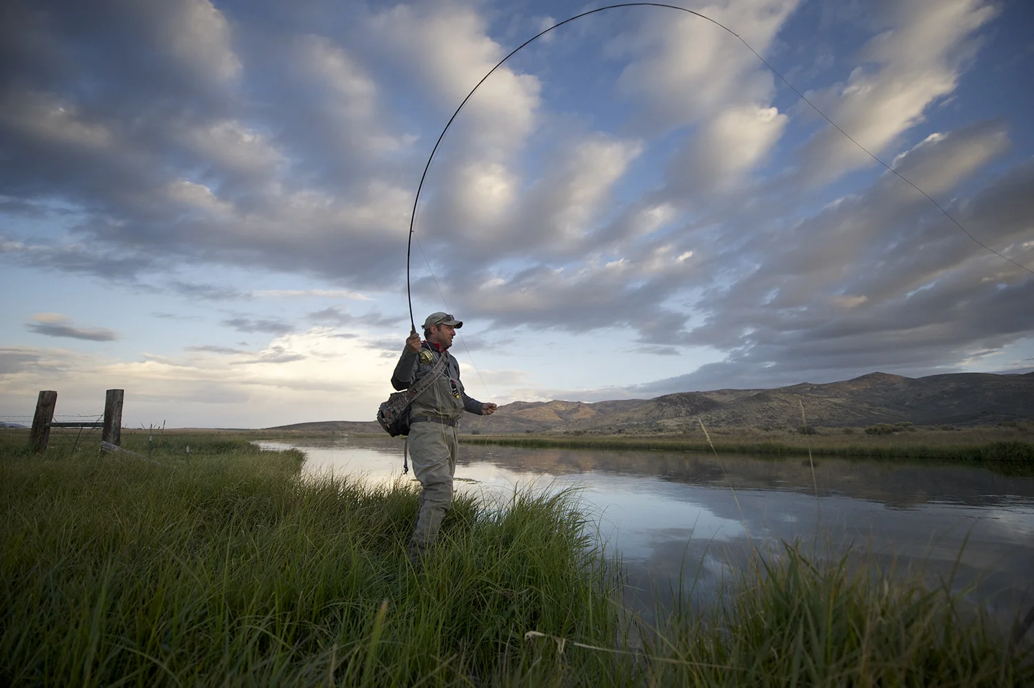 John Huber throwing an early-fall hopper to the far bank moments after sunrise.