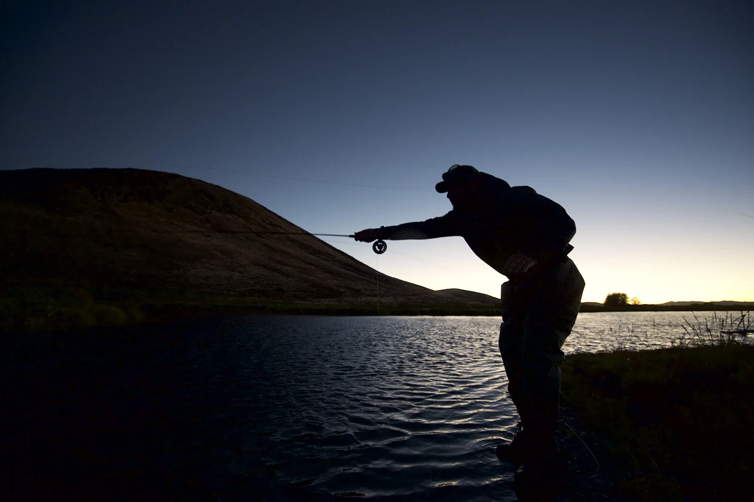 John Huber lets a cast run after sunset.