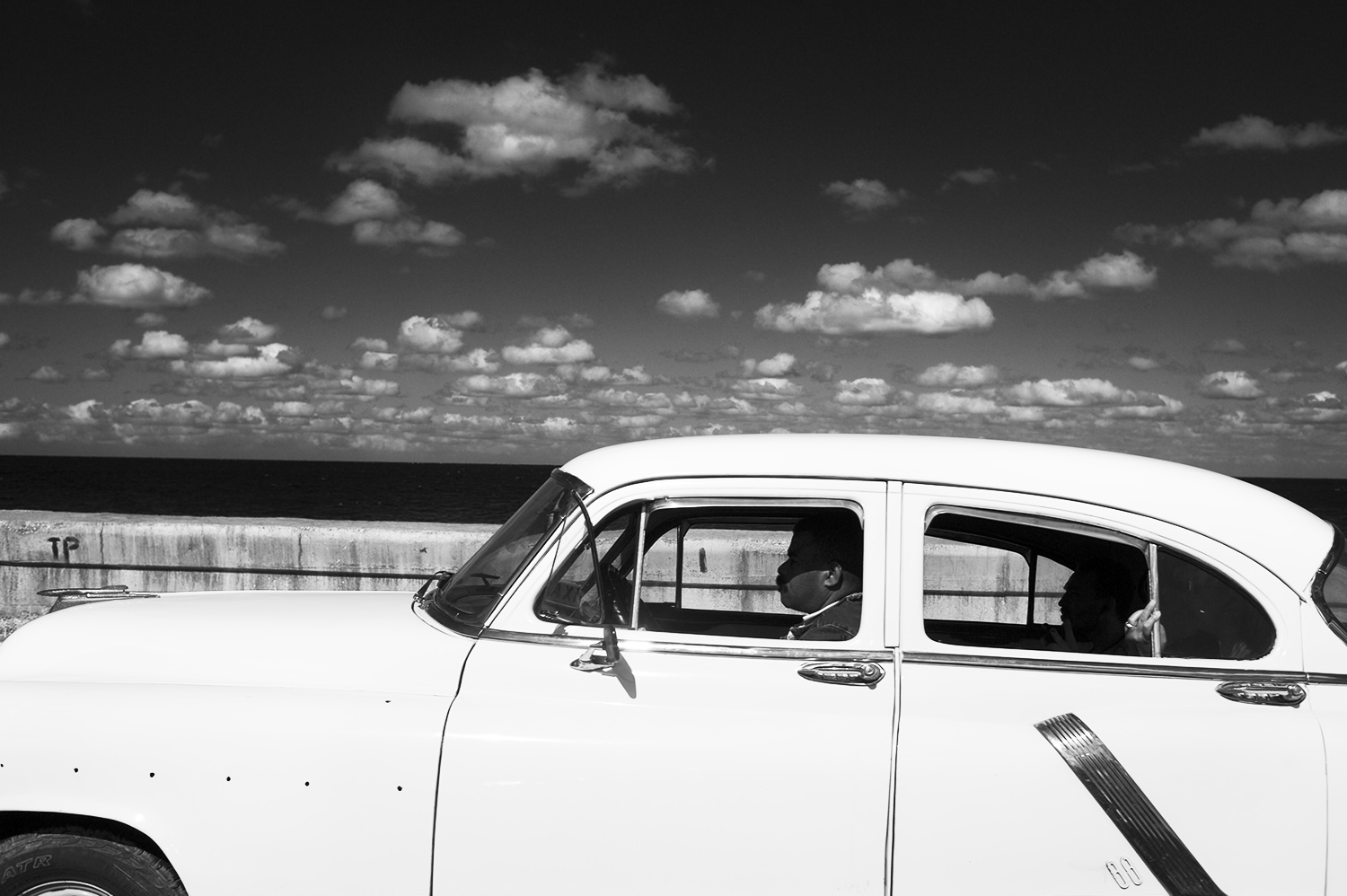 Malecon Car and Passengers. Cuba