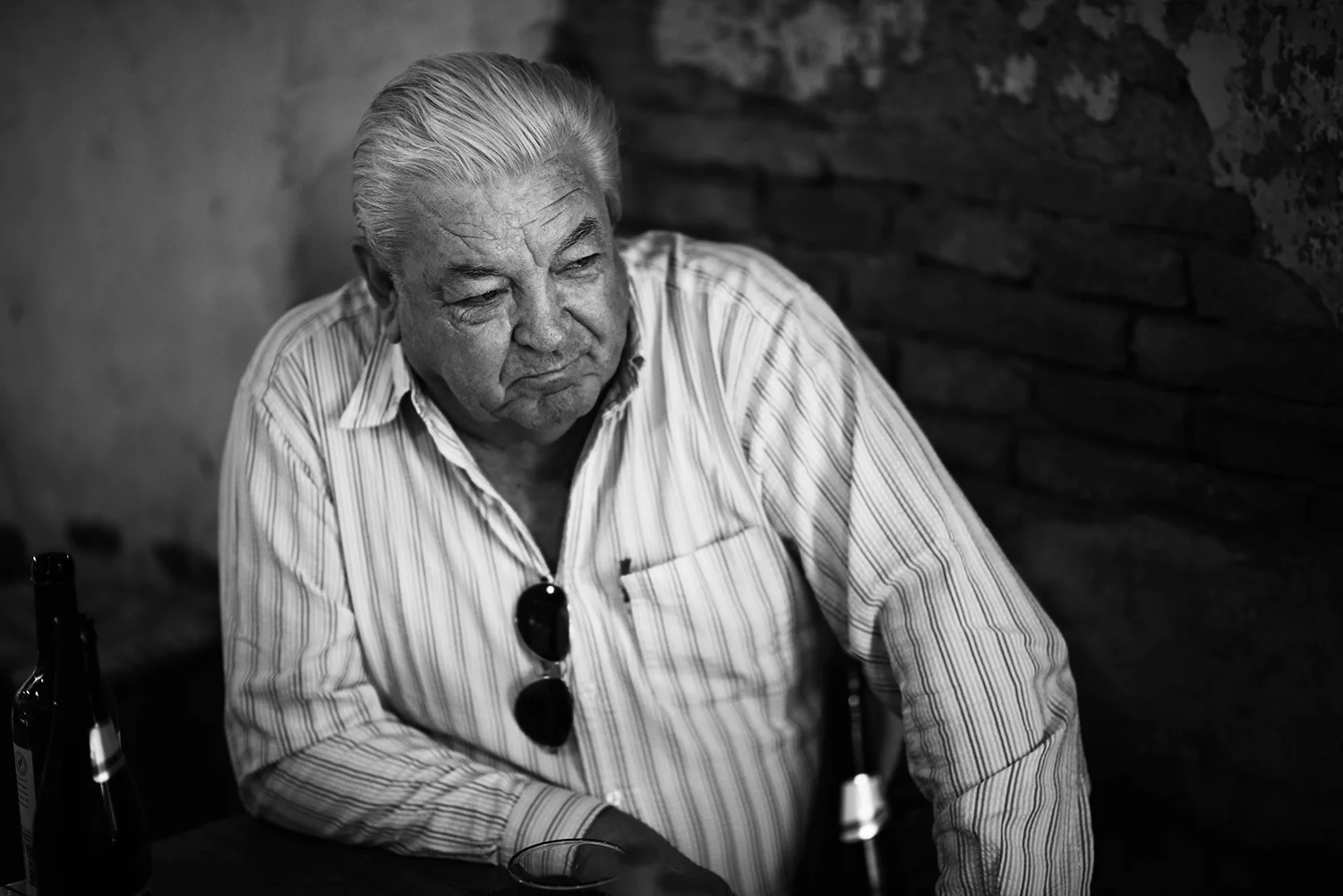 Diego Kelly of San Antonio de Areco sits in a bar during a typical Argentine lunch of Malbec and asado.