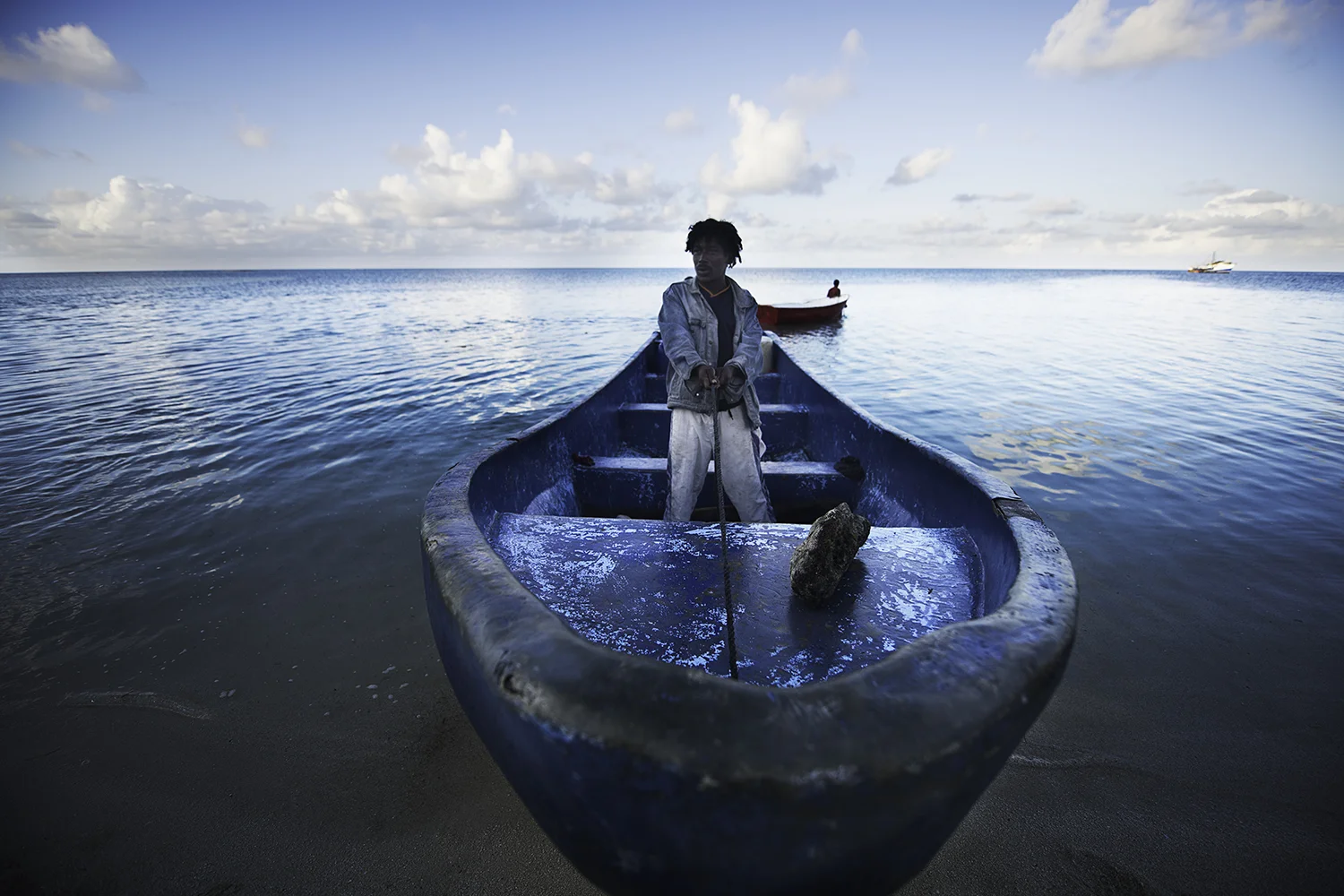 A Miskito Indian in his panga on Faraway Cay.