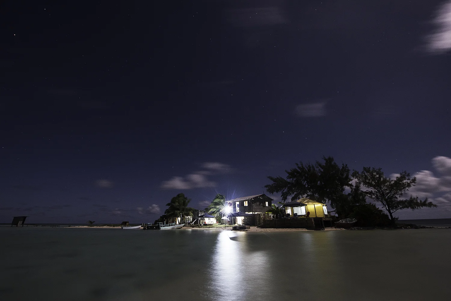 Faraway Cay, Honduras. This tiny gem took 27 hours by boat to get to, and only 90 minutes by helicopter to return from. It's part of the Mosquito Coast located about forty miles off the southern Honduran mainland.