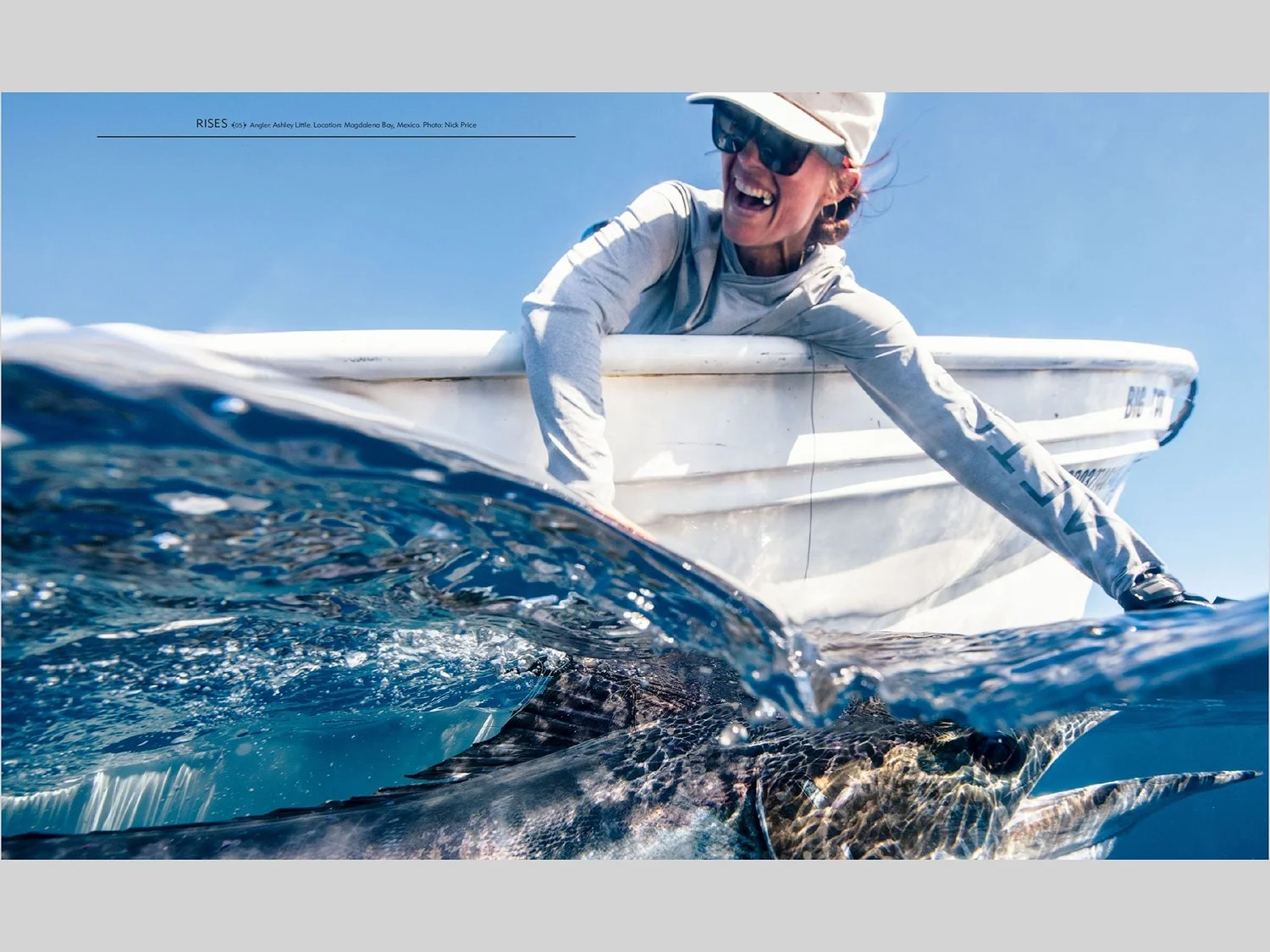 A flyfisherman and a striped marlin. Magdalena Bay. Baja, Mexico