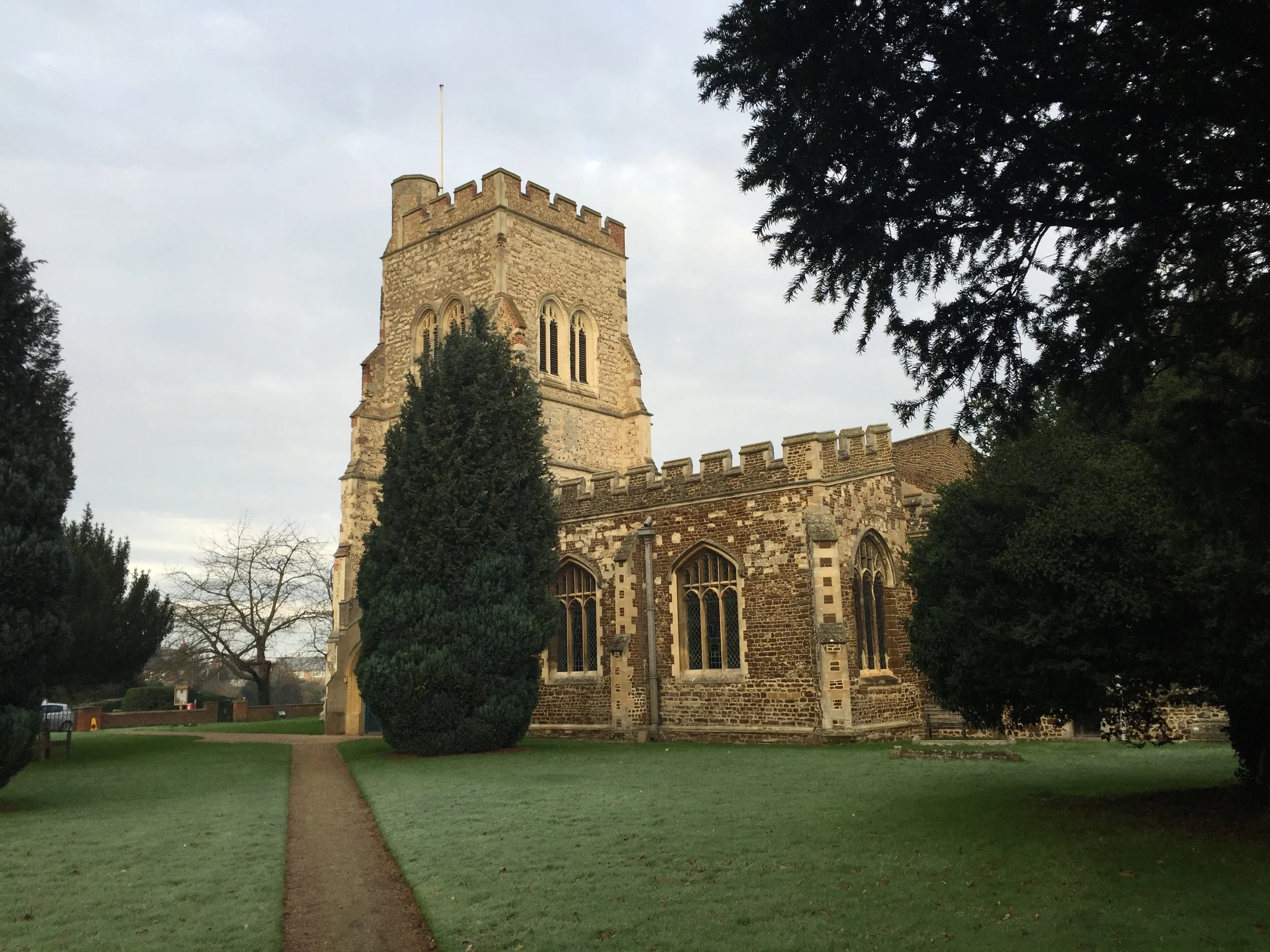 The parish church of Henlow, Bedfordshire, where Joan (Hurst)(Rogers) Tilley was baptized in 1568, married in 1593 and 1596, and where her children were baptized.