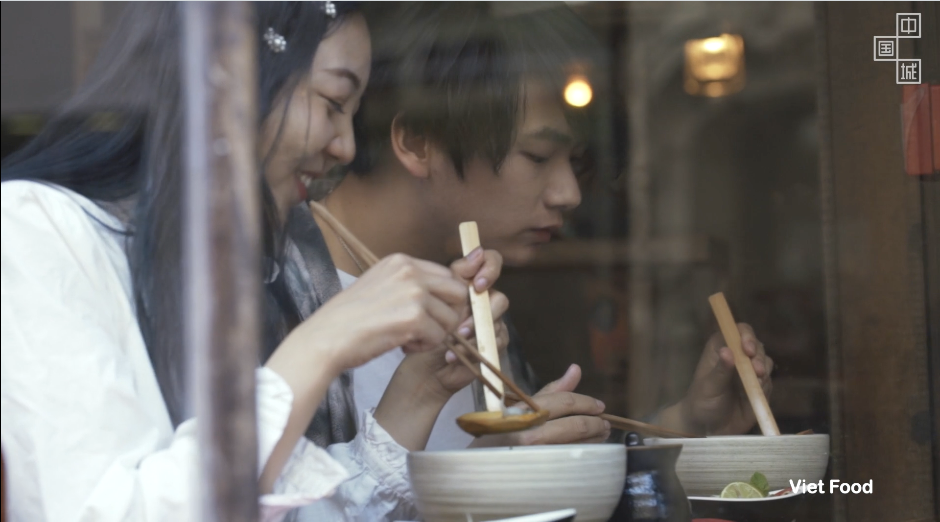 A-couple-eat-Ramen-Chinatown-London-by-writer-director-editor-Jess-Dowse.png