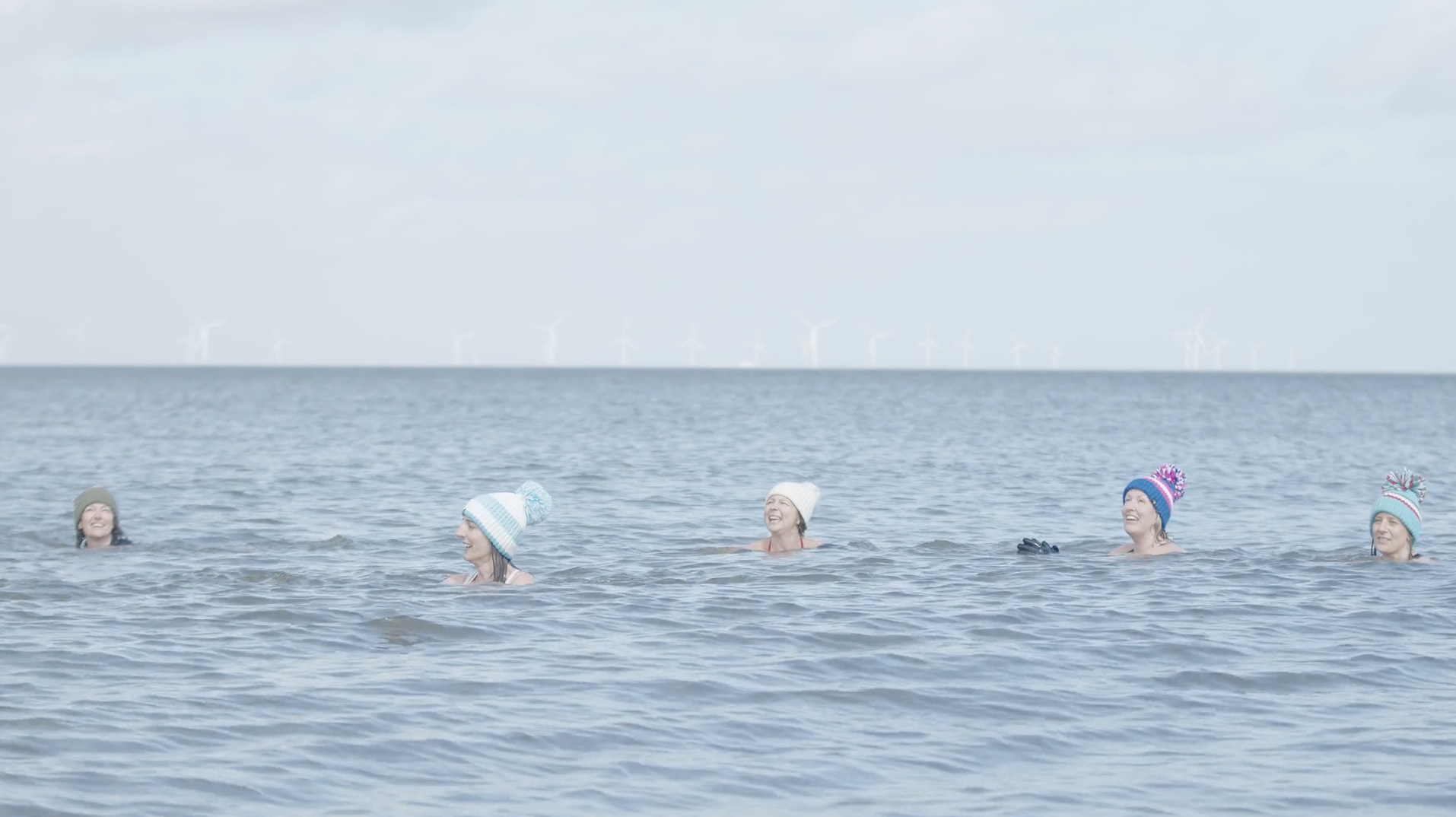 A group of women in the sea