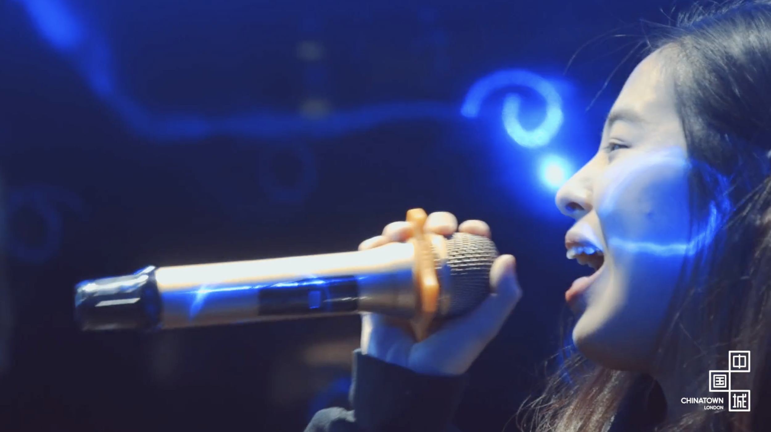 A girl sings Karaoke