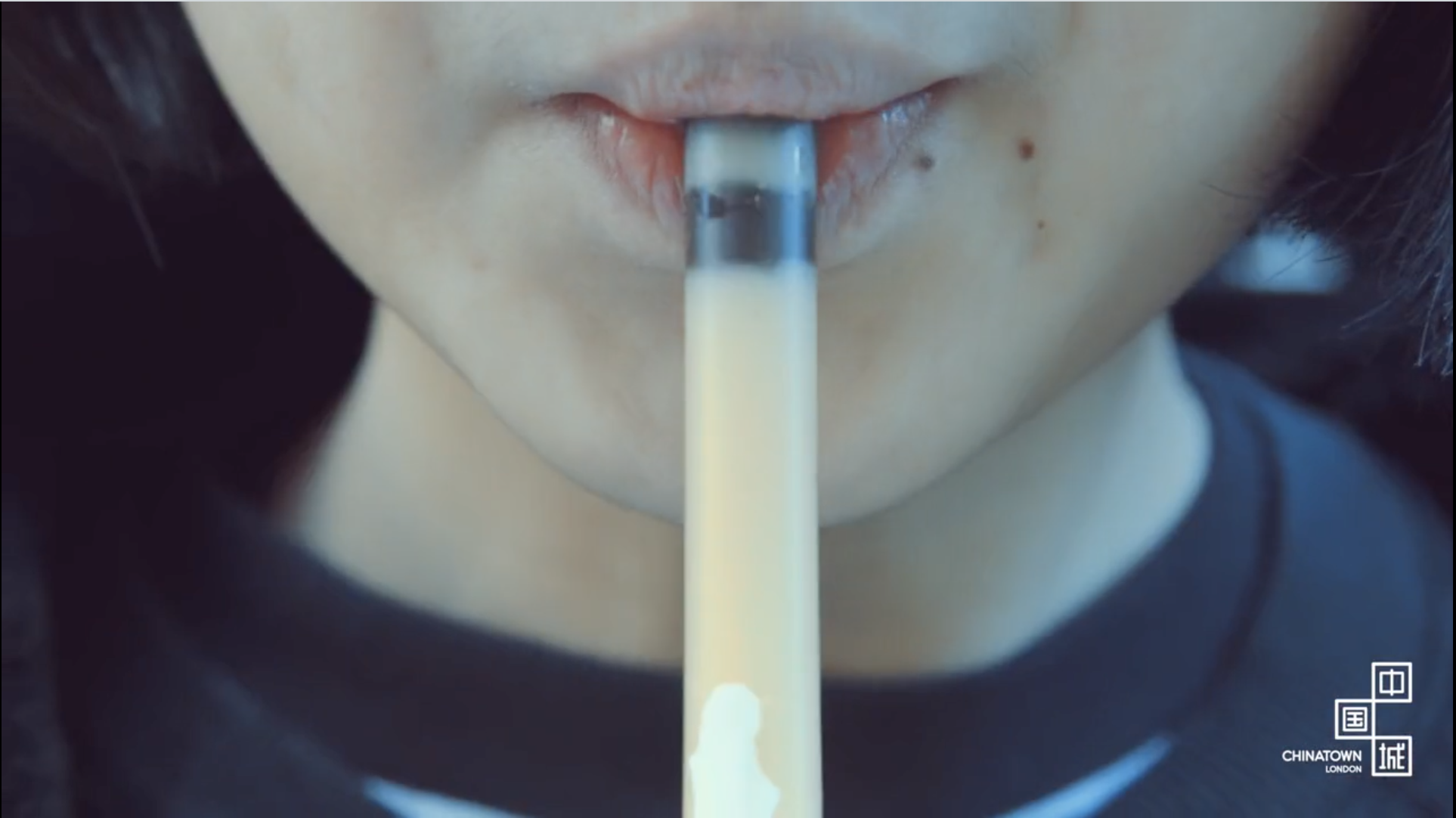 A tapioca pearl in a straw